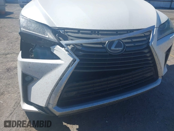 2018 Lexus RX 350 z VIN 2T2BZMCAXJC144930, wystawiony jako IAAI lot #41857778 z przebiegiem 108 191 mil mil oraz . Historia ofert i sprzedaży dostępna na DreamBid. Obrazek 18.