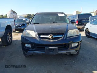 2004 Acura MDX with VIN 2HNYD18294H538551, listed as a IAAI auction lot 42153231 with 217,462 mi miles. Bid and sale history available at carsss.com. Image 6.