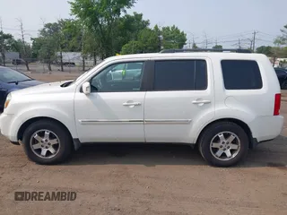 2011 Honda Pilot Touring z VIN 5FNYF4H9XBB003469, wystawiony jako IAAI lot #42369323 z przebiegiem 201 958 mil mil oraz . Historia ofert i sprzedaży dostępna na DreamBid. Obrazek 14.