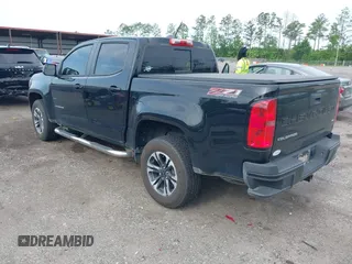 2021 Chevrolet Colorado 4WD Z71 with VIN 1GCGTDEN5M1190797, listed as a IAAI auction lot 42473079 with 77,290 mi miles and . Bid and sale history available at DreamBid. Image 3.