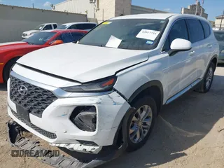 2019 Hyundai Santa Fe SE with VIN 5NMS23AD8KH051223, listed as a IAAI auction lot 42017754 with 146,704 mi miles and . Bid and sale history available at DreamBid. Image 17.