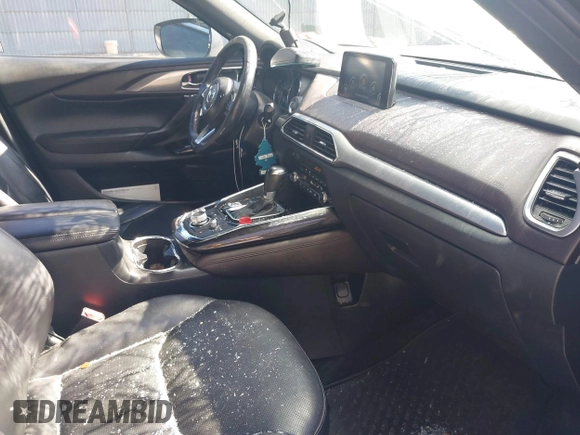 2019 Mazda CX-9 Grand Touring with VIN JM3TCBDY3K0307964, listed as a IAAI auction lot 41706594 with 170,596 mi miles and . Bid and sale history available at DreamBid. Image 5.