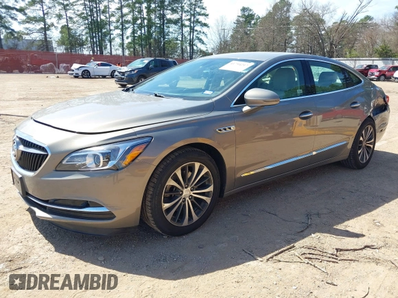 2017 Buick LaCrosse Essence with VIN 1G4ZP5SS0HU179056, listed as a IAAI auction lot 41794217 with 166,891 mi miles. Bid and sale history available at carsss.com. Image 2.