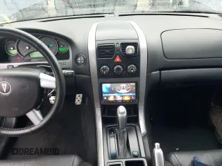 2005 Pontiac GTO z VIN 6G2VX12U15L381992, wystawiony jako Copart lot #74657644 z przebiegiem 21 995 mil mil oraz Szkody całkowita. Historia ofert i sprzedaży dostępna na DreamBid. Obrazek 8.