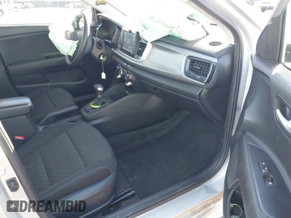 2020 Kia Rio S with VIN 3KPA25AD7LE348113, listed as a IAAI auction lot 41365528 with 43,633 mi miles and . Bid and sale history available at DreamBid. Image 5.