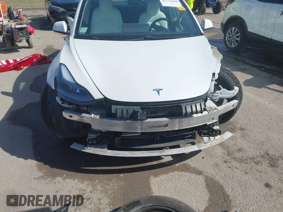 2021 Tesla Model 3 Long Range z VIN 5YJ3E1EB0MF860289, wystawiony jako IAAI lot #41771854 z przebiegiem 190 892 mil mil oraz . Historia ofert i sprzedaży dostępna na DreamBid. Obrazek 6.