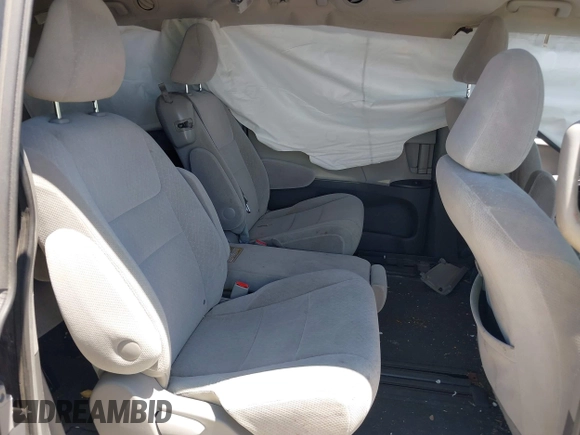2015 Toyota Sienna LE AAS with VIN 5TDKK3DC7FS687525, listed as a IAAI auction lot 42250458 with 140,429 mi miles and . Bid and sale history available at DreamBid. Image 8.