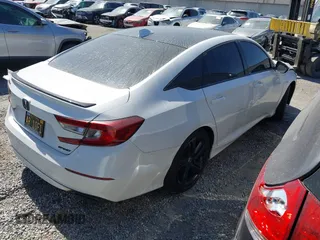 2019 Honda Accord Sport with VIN 1HGCV1F38KA156534, listed as a IAAI auction lot 42472023 with 66,752 mi miles and . Bid and sale history available at DreamBid. Image 4.