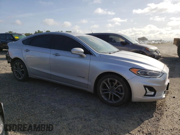 2019 Ford Fusion Titanium z VIN 3FA6P0RU5KR217242, wystawiony jako Copart lot #51985955 z przebiegiem 95 220 mil mil oraz Szkoda całkowita • Salvage title. Historia ofert i sprzedaży dostępna na DreamBid. Obrazek 4.