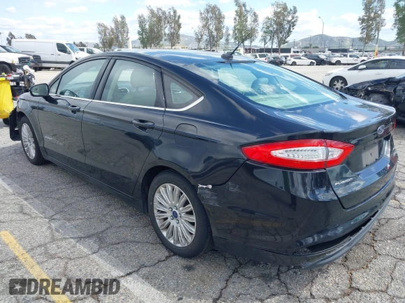 2015 Ford Fusion SE Hybrid with VIN 3FA6P0LU7FR199065, listed as a IAAI auction lot 41944181 with 197,020 mi miles. Bid and sale history available at carsss.com. Image 3.