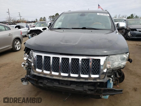 2011 Jeep Grand Cherokee Overland with VIN 1J4RR6GT9BC660730, listed as a Copart auction lot 53770745 with 106,351 mi miles and Salvage title. Bid and sale history available at DreamBid. Image 5.