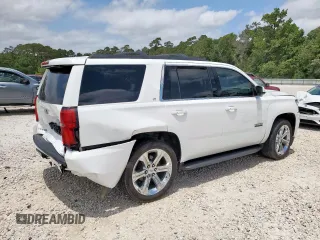 2019 Chevrolet Tahoe LT with VIN 1GNSCBKC1KR226315, listed as a Copart auction lot 57215915 with 153,170 mi miles and Salvage title. Bid and sale history available at DreamBid. Image 3.
