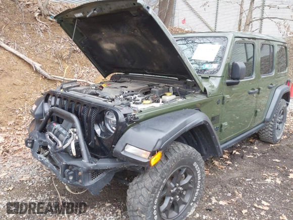 2021 Jeep Wrangler Unlimited Willys with VIN 1C4HJXDNXMW579595, listed as a IAAI auction lot 41930989 with 32,148 mi miles and . Bid and sale history available at DreamBid. Image 6.
