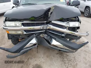 2004 Chevrolet Suburban LT z VIN 1GNFK16ZX4J291419, wystawiony jako IAAI lot #42163331 z przebiegiem 235 054 mil mil oraz . Historia ofert i sprzedaży dostępna na DreamBid. Obrazek 6.