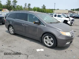 2013 Honda Odyssey Touring with VIN 5FNRL5H98DB053891, listed as a Copart auction lot 59592425 with 174,773 mi miles and Clean title. Bid and sale history available at DreamBid. Image 4.