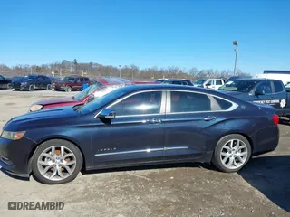 2014 Chevrolet Impala LTZ with VIN 2G1155S3XE9239989, listed as a IAAI auction lot 41749415 with 158,248 mi miles. Bid and sale history available at carsss.com. Image 14.