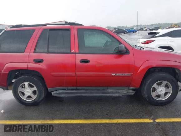 2003 Chevrolet TrailBlazer LS with VIN 1GNDS13S732274374, listed as a IAAI auction lot 42083080 with Not Provided miles and . Bid and sale history available at DreamBid. Image 13.