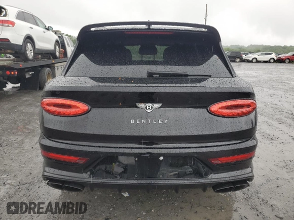 2022 Bentley Bentayga V8 z VIN SJAAM2ZV8NC039607, wystawiony jako Copart lot #54888564 z przebiegiem 15 561 mil mil oraz . Historia ofert i sprzedaży dostępna na DreamBid. Obrazek 6.