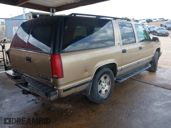1999 Chevrolet Suburban with VIN 1GNFK16RXXJ416360, listed as a IAAI auction lot 42670294 with 319,691 mi miles and . Bid and sale history available at DreamBid. Image 4.