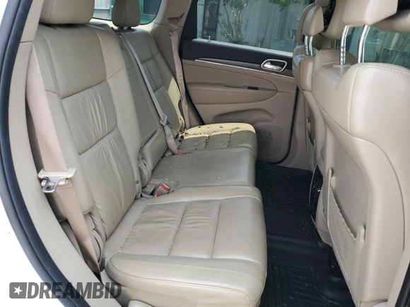 2016 Jeep Grand Cherokee Limited 75th Anniversary with VIN 1C4RJEBG0GC358588, listed as a Copart auction lot 57585695 with 221,460 mi miles and Salvage title. Bid and sale history available at DreamBid. Image 11.