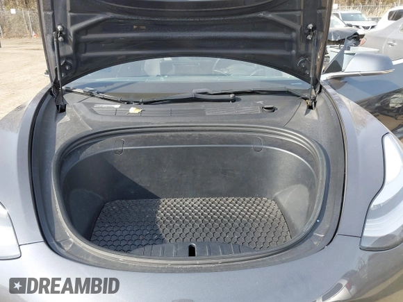 2018 Tesla Model 3 Long Range Battery with VIN 5YJ3E1EB5JF063077, listed as a IAAI auction lot 41773551 with 99,477 mi miles and . Bid and sale history available at DreamBid. Image 10.