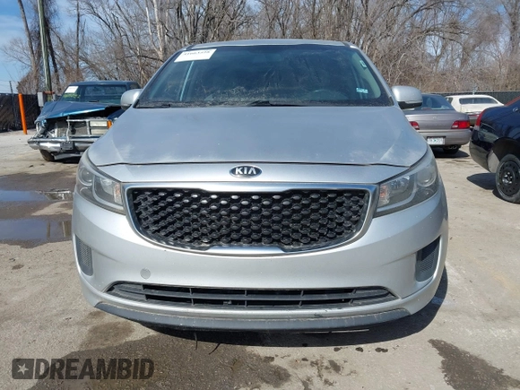 2016 Kia Sedona L with VIN KNDMA5C17G6103195, listed as a IAAI auction lot 41663528 with 322,257 mi miles. Bid and sale history available at carsss.com. Image 6.