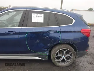 2018 BMW X1 xDrive28i with VIN WBXHT3C32J5L33213, listed as a IAAI auction lot 42513235 with 75,918 mi miles and . Bid and sale history available at DreamBid. Image 6.