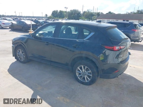 2023 Mazda CX-5 2.5 S with VIN JM3KFBAM3P0104813, listed as a IAAI auction lot 41540923 with 30,861 mi miles. Bid and sale history available at carsss.com. Image 3.