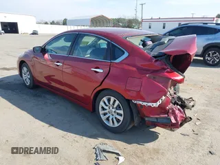 2014 Nissan Altima 2.5 with VIN 1N4AL3AP9EC272020, listed as a IAAI auction lot 41845156 with 217,927 mi miles. Bid and sale history available at carsss.com. Image 3.