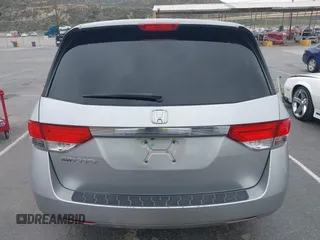 2014 Honda Odyssey LX z VIN 5FNRL5H28EB064426, wystawiony jako IAAI lot #42207634 z przebiegiem 169 706 mil mil oraz . Historia ofert i sprzedaży dostępna na DreamBid. Obrazek 16.