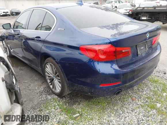 2019 BMW 5 Series 530e iPerformance with VIN WBAJA9C59KB389898, listed as a IAAI auction lot 41479595 with 90,965 mi miles. Bid and sale history available at carsss.com. Image 3.