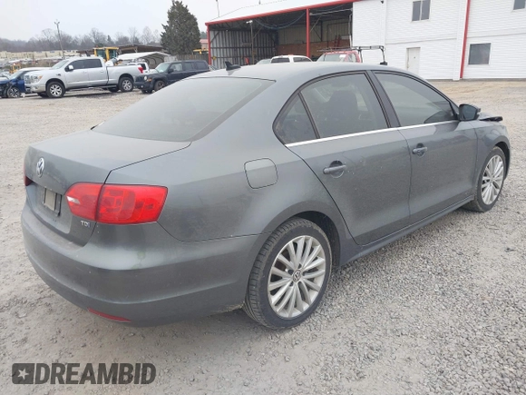 2014 Volkswagen Jetta TDI with VIN 3VWLL7AJ0EM389924, listed as a IAAI auction lot 41271290 with 241,452 mi miles and . Bid and sale history available at DreamBid. Image 4.