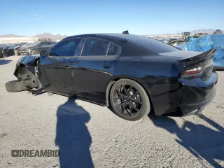2015 Dodge Charger SXT with VIN 2C3CDXHG8FH769883, listed as a Copart auction lot 87723825 with 81,859 mi miles and Salvage Title. Bid and sale history available at DreamBid. Image 2.