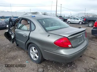 2003 Ford Taurus SES Standard with VIN 1FAFP55293A193556, listed as a IAAI auction lot 42562880 with 144,902 mi miles and . Bid and sale history available at DreamBid. Image 3.
