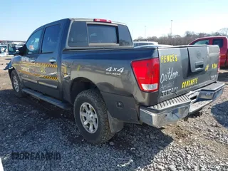 2005 Nissan Titan SE with VIN 1N6BA07B15N569959, listed as a IAAI auction lot 41389671 with 188,335 mi miles and . Bid and sale history available at DreamBid. Image 3.