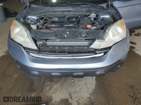 2009 Honda CR-V EX-L z VIN 5J6RE487X9L069169, wystawiony jako Copart lot #58907595 z przebiegiem 114 289 mil mil oraz Szkoda całkowita • Salvage title. Historia ofert i sprzedaży dostępna na DreamBid. Obrazek 12.