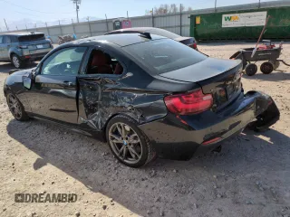 2015 BMW 2 Series M235i xDrive with VIN WBA1J9C5XFV371057, listed as a Copart auction lot 51994765 with 189,788 mi miles and Salvage Title. Bid and sale history available at carsss.com. Image 2.