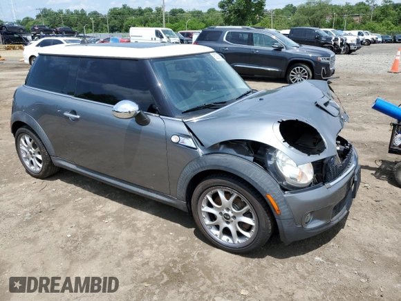 2007 MINI Hardtop S with VIN WMWMF73577TT84087, listed as a Copart auction lot 60208895 with 76,248 mi miles and Salvage title. Bid and sale history available at DreamBid. Image 4.