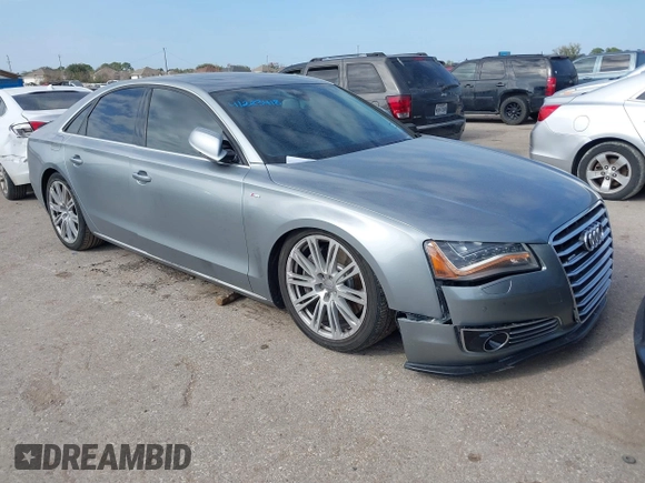 2011 Audi A8 with VIN WAUAVAFD5BN021080, listed as a IAAI auction lot 41223418 with 80,538 mi miles and . Bid and sale history available at DreamBid. Image 1.