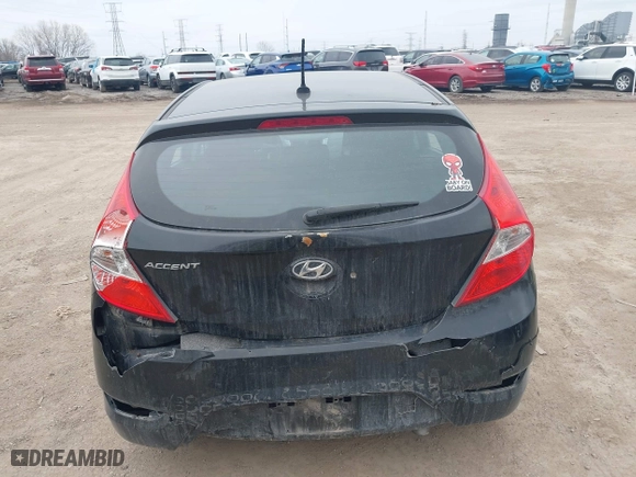 2014 Hyundai Accent GS with VIN KMHCT5AE6EU197814, listed as a IAAI auction lot 41697539 with 228,490 mi miles. Bid and sale history available at carsss.com. Image 6.