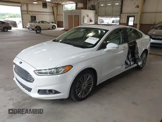 2014 Ford Fusion SE with VIN 3FA6P0HD8ER372731, listed as a IAAI auction lot 39915643 with 136,635 mi miles and . Bid and sale history available at DreamBid. Image 2.