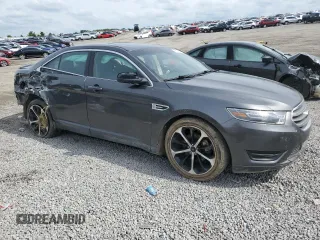 2015 Ford Taurus SEL z VIN 1FAHP2E89FG177287, wystawiony jako Copart lot #56074615 z przebiegiem 196 421 mil mil oraz Szkoda całkowita • Salvage title. Historia ofert i sprzedaży dostępna na DreamBid. Obrazek 4.