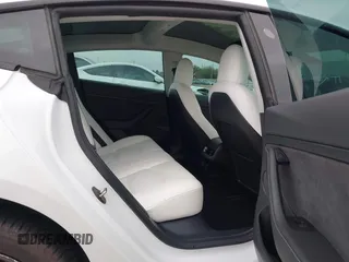 2021 Tesla Model 3 Long Range with VIN 5YJ3E1EB3MF059713, listed as a IAAI auction lot 41778289 with 52,211 mi miles. Bid and sale history available at carsss.com. Image 8.