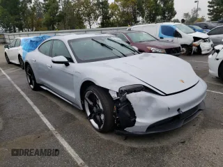 2021 Porsche Taycan 4S z VIN WP0AB2Y15MSA44483, wystawiony jako Copart lot #44510623 z przebiegiem 27 812 mil mil oraz . Historia ofert i sprzedaży dostępna na DreamBid. Obrazek 4.