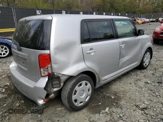 2014 Scion xB with VIN JTLZE4FE0EJ049899, listed as a Copart auction lot 52962125 with 120,791 mi miles and Salvage Title. Bid and sale history available at carsss.com. Image 3.