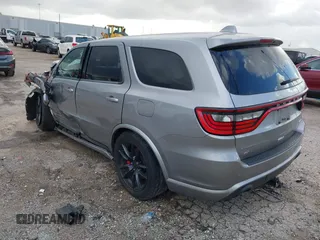 2018 Dodge Durango SRT with VIN 1C4SDJGJ5JC256006, listed as a IAAI auction lot 41038356 with 71,385 mi miles and . Bid and sale history available at DreamBid. Image 3.