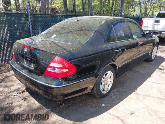 2005 Mercedes-Benz E-Class 3.2L with VIN WDBUF65J15A649830, listed as a IAAI auction lot 42062140 with 170,633 mi miles. Bid and sale history available at carsss.com. Image 4.