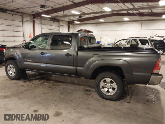 2013 Toyota Tacoma with VIN 3TMMU4FN9DM052987, listed as a IAAI auction lot 42325979 with 200,379 mi miles and . Bid and sale history available at DreamBid. Image 14.