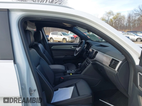 2022 Volkswagen Atlas SE with VIN 1V2JE2CA5NC220468, listed as a IAAI auction lot 40873030 with 78,867 mi miles and . Bid and sale history available at DreamBid. Image 5.