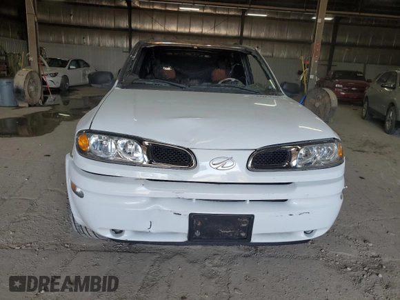 2002 Oldsmobile Bravada z VIN 1GHDT13S922187283, wystawiony jako Copart lot #55023094 z przebiegiem Nie podano mil oraz Szkoda całkowita • Salvage title. Historia ofert i sprzedaży dostępna na DreamBid. Obrazek 5.